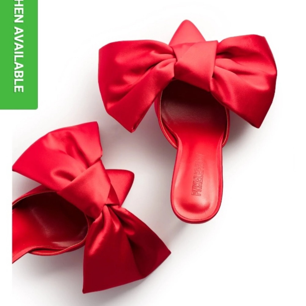 Iconic big Bow red heel mule